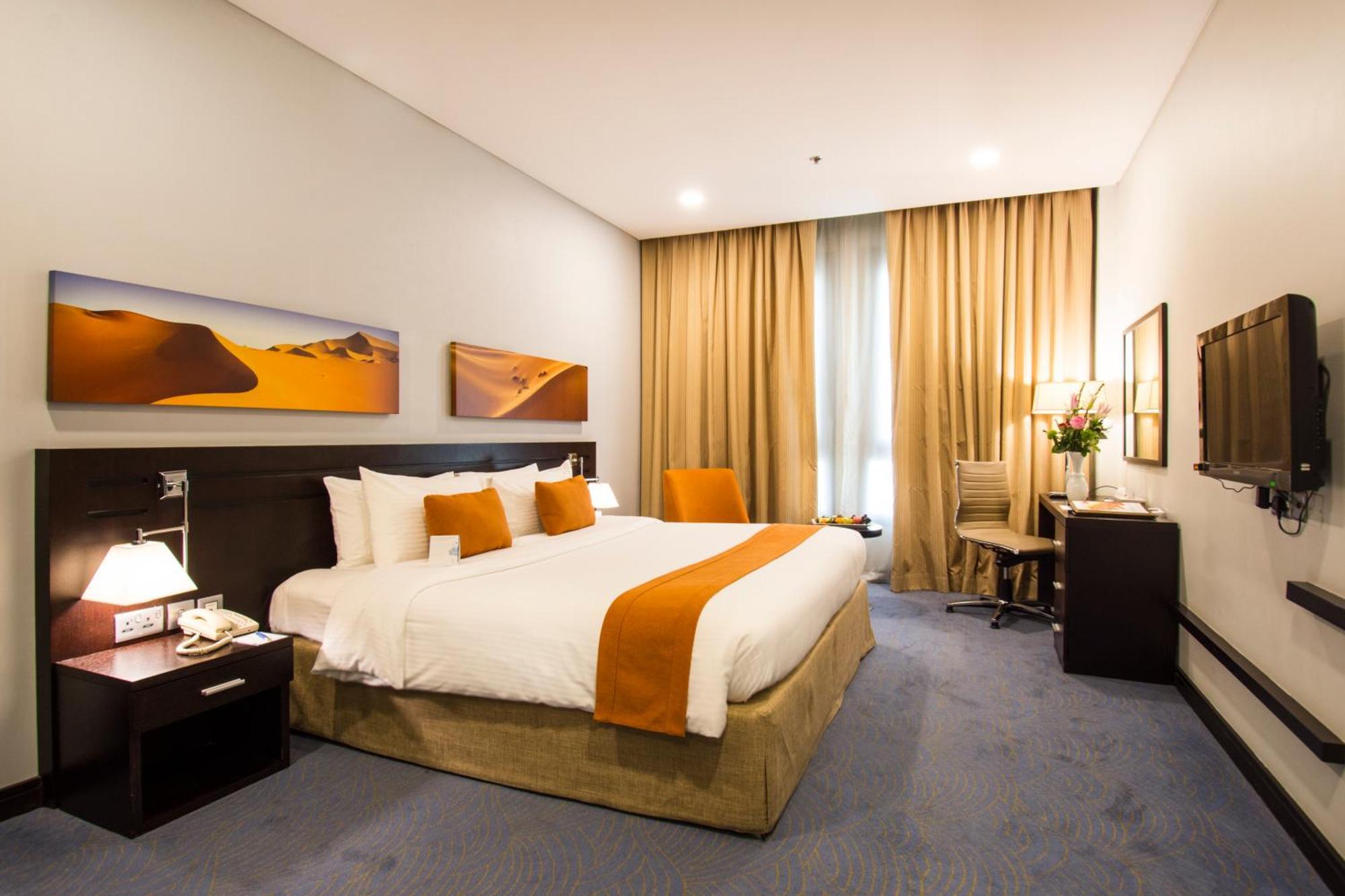 City Seasons Hotel & Suites Mascate Habitación foto