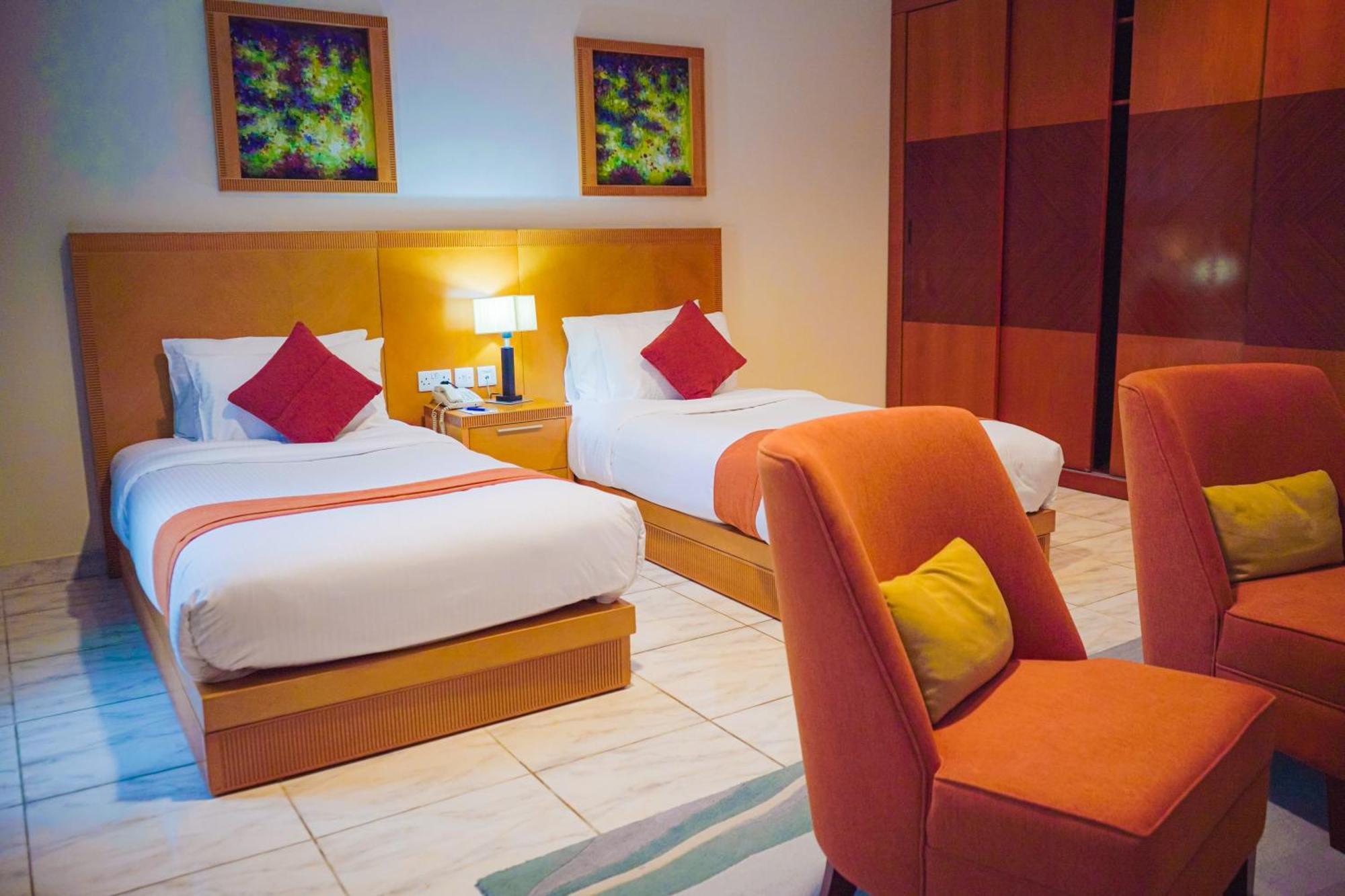 City Seasons Hotel & Suites Mascate Habitación foto