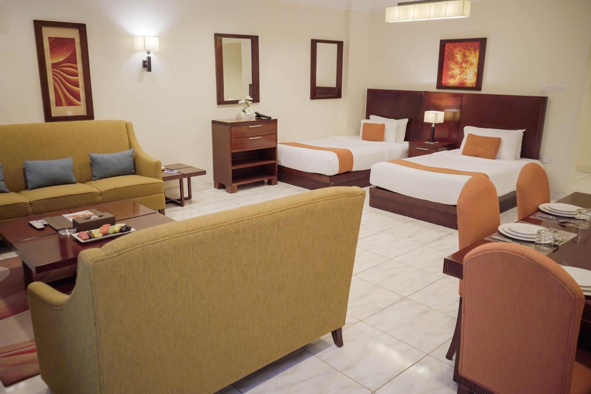 City Seasons Hotel & Suites Mascate Habitación foto